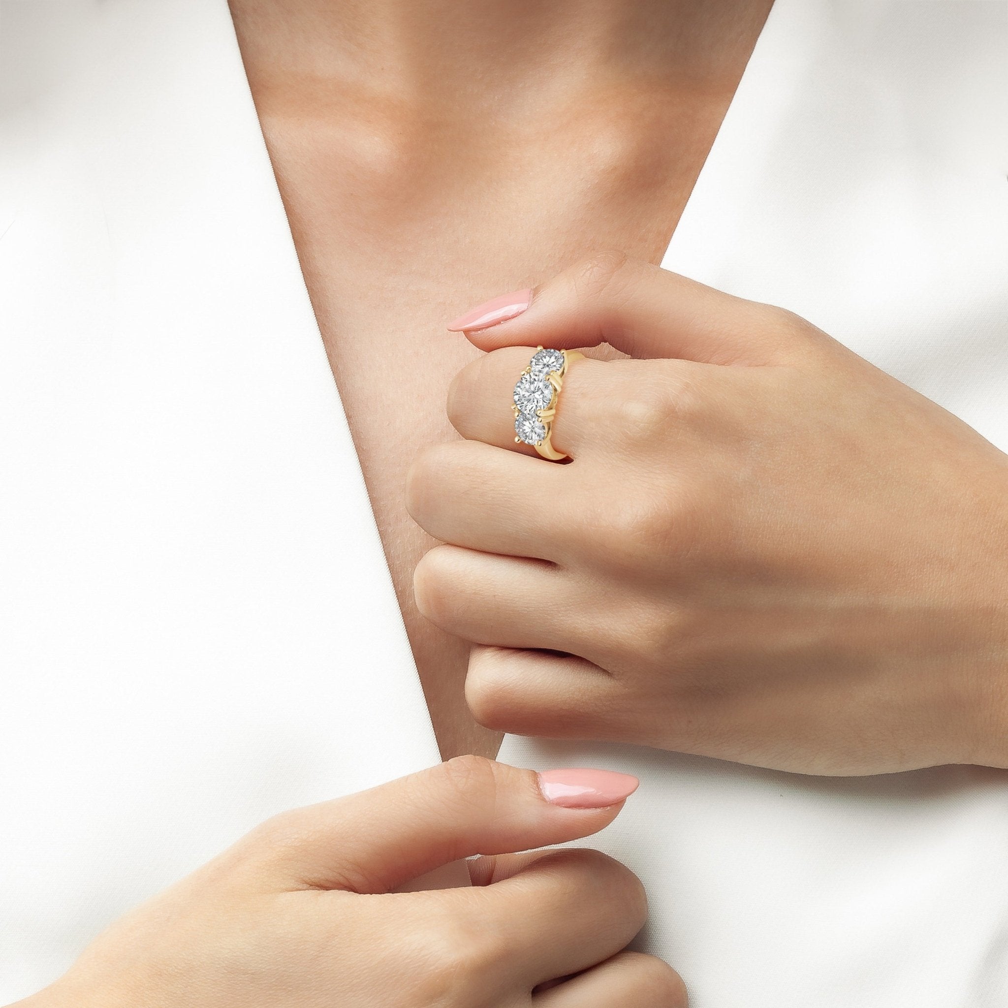 Three Stone Brilliant Ring Finished In Gold - CRISLU