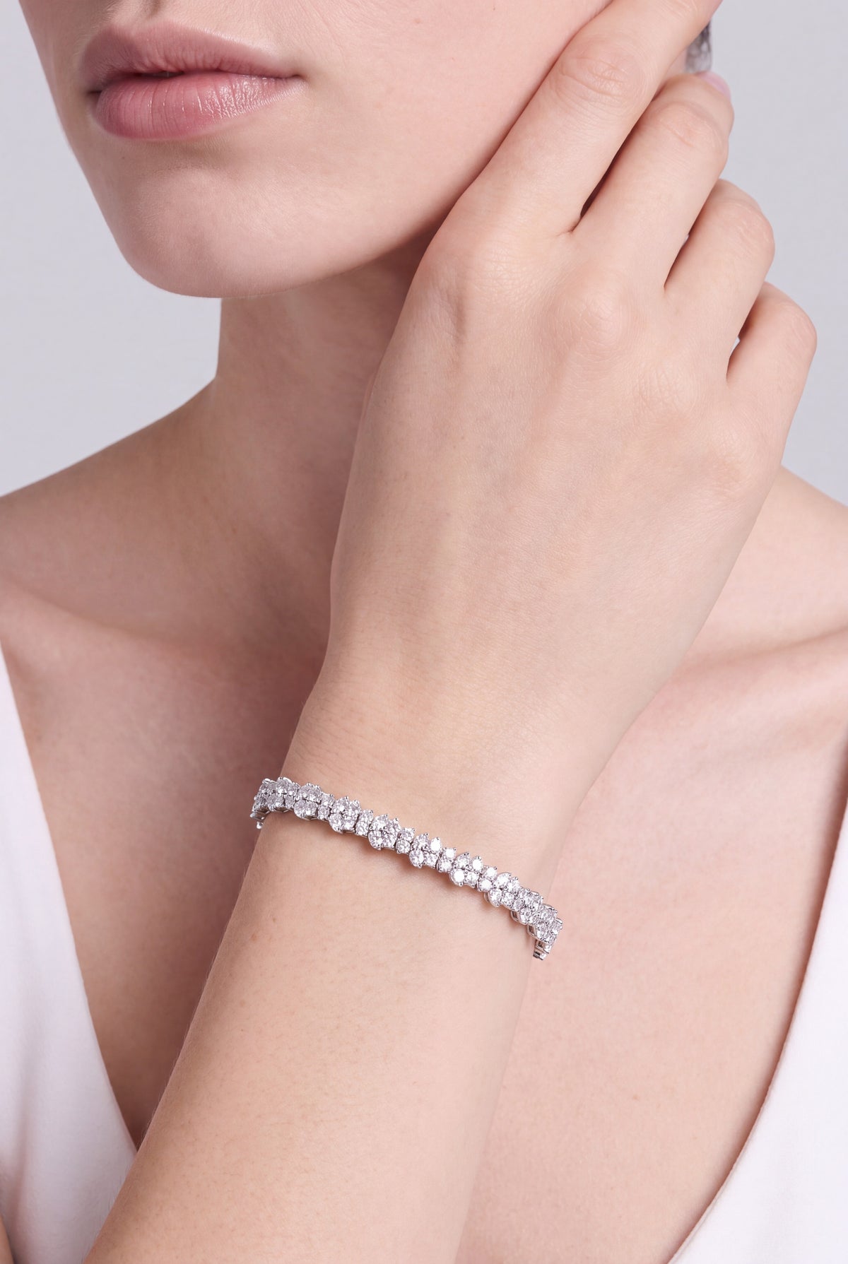 Multi Cluster Tennis Bracelet Finished in Platinum