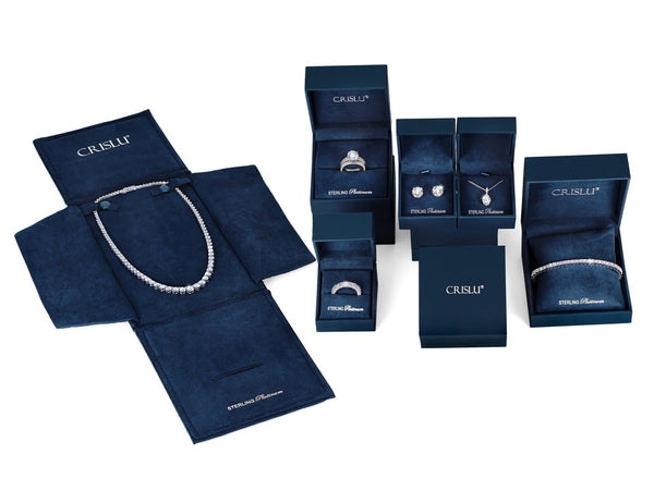 Solitaire Bezel Set Pear Stud Earrings Finished In Pure Platinum - CRISLU