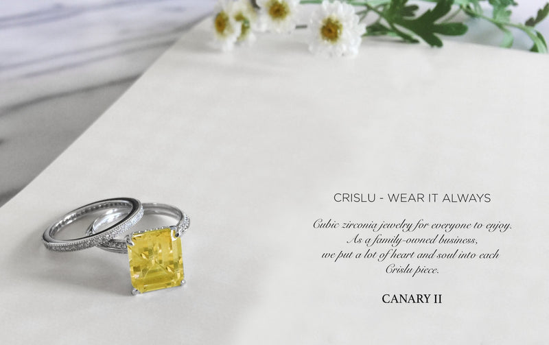 STEP-CUT EMERALD CANARY RING WITH PAVE BAND - CRISLU